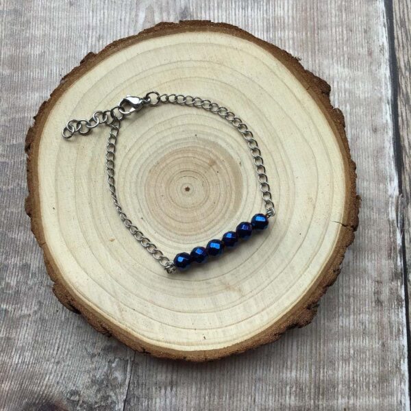 Handmade Blue Hematite Bracelet. Bracelet features a bar of Blue Hematite beads with stainless steel chain.