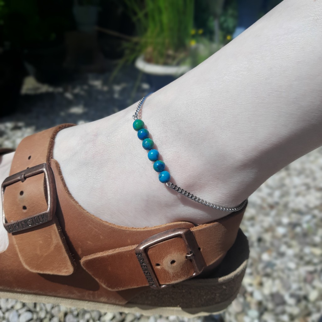 Handmade Azurite Chrysocolla Anklet. Anklet features a row of round Azurite beads suspended on stainless steel chain.